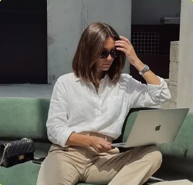 Working on a laptop on a sofa